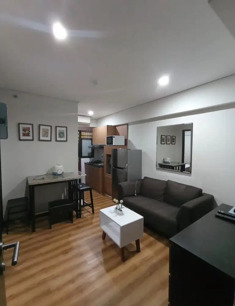 Dijual Apt. 2 kamar furnished Rp 450 juta