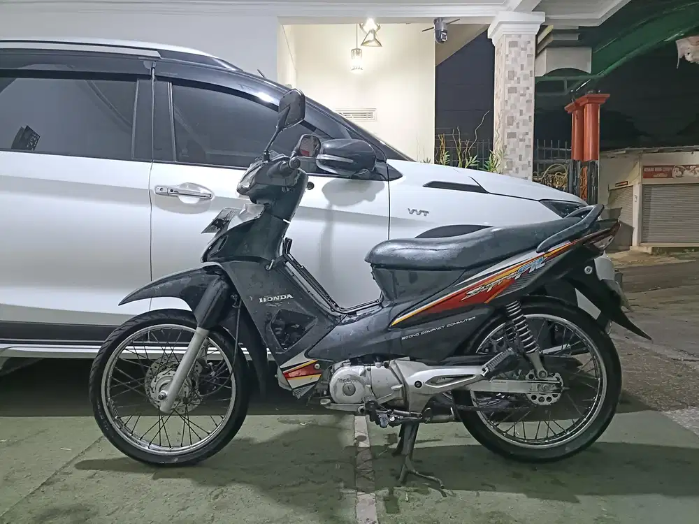 Supra fit tahun 2006 pajak isi/tt boleh gan cash lebih bagus