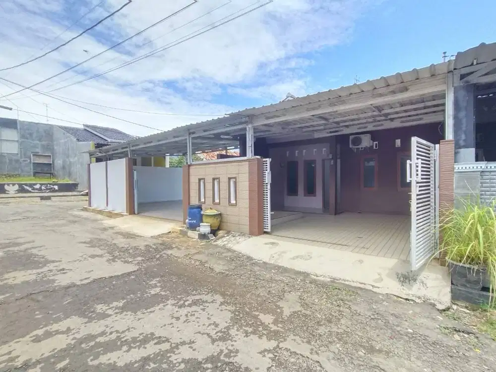 Rumah dan tanah kosong+sudah dibangun garasi
