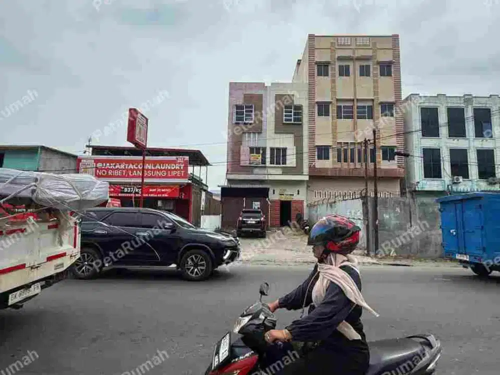 Ruko Jalan Williem Iskandar Simpang Jalan Meteorologi