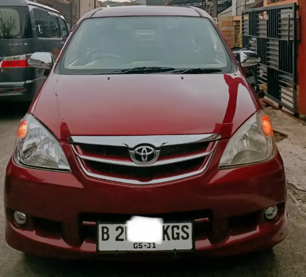 Avanza G 2007 manual warna merah