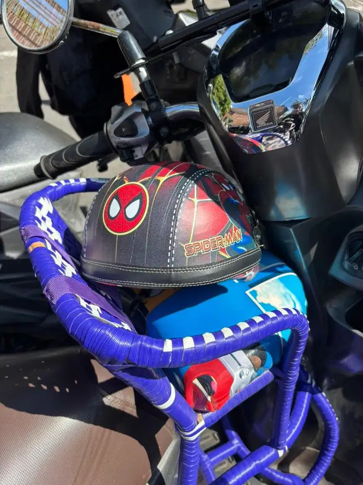 Tempat duduk anak motor