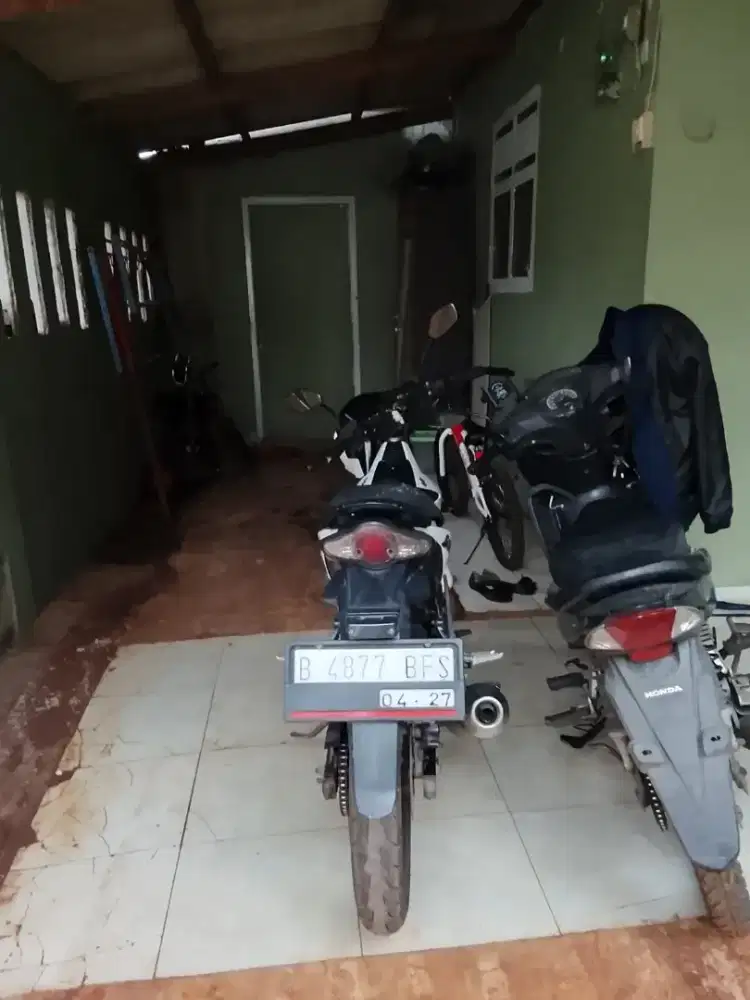 Motor satria f .