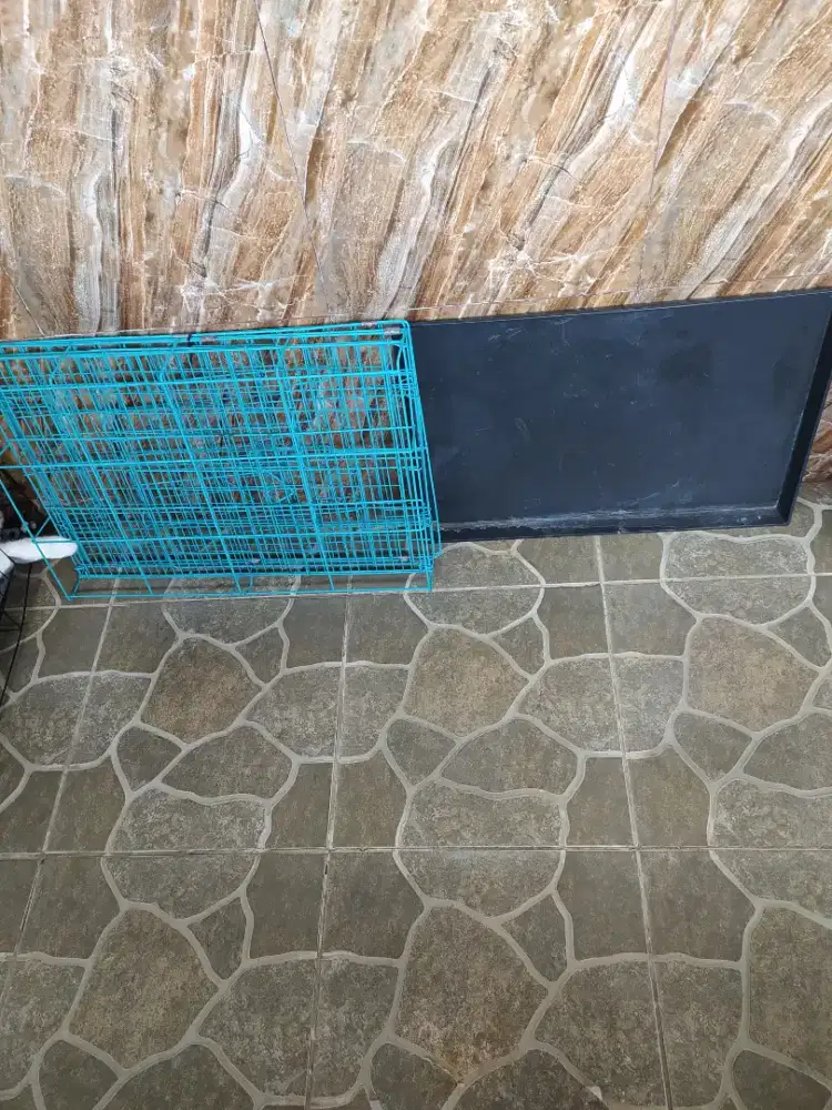 Kandang besi lipat untuk kucing