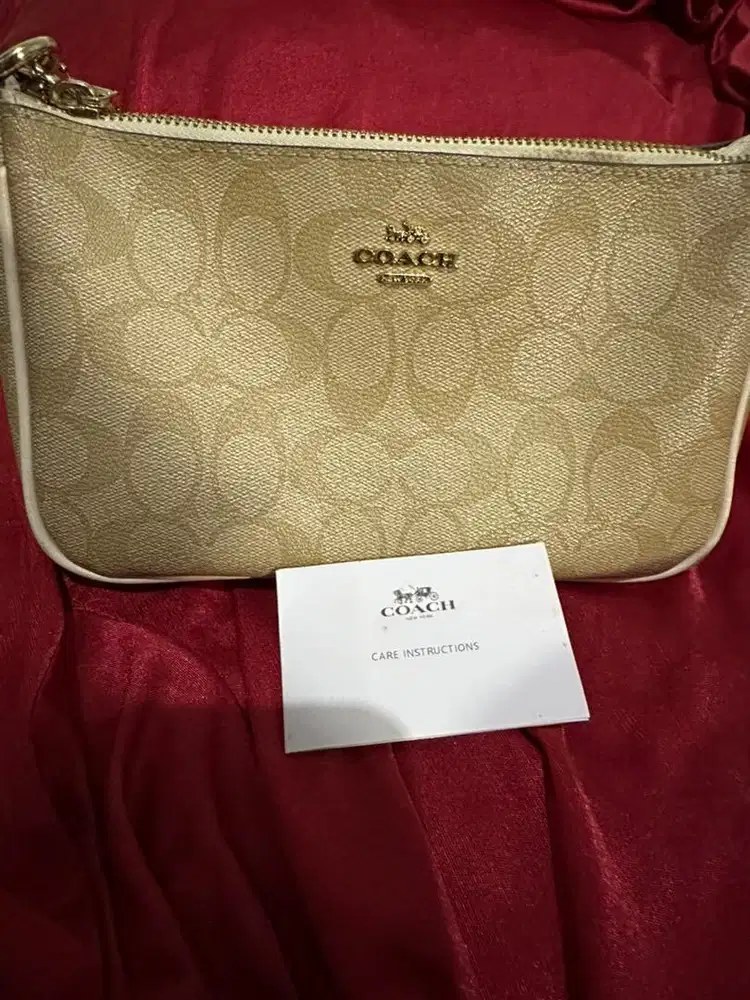 Coach Wrislet handle pouch