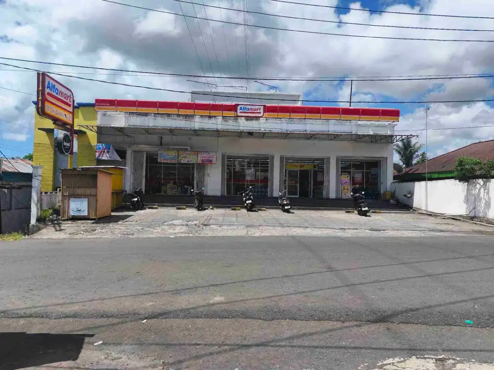 Dijual murah empat ruko dengan tanah luas sedang disewa oleh Alfamart masa sewa akan diperpanjang tahun ini, lokasi strategis jalur ramai terletak di perempatan depan bundaran menuju Bitung dan menuju Kema