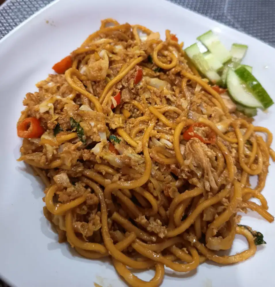 Penjaga Lapak Mie Tek Tek
