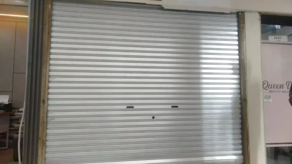 Tukang ahli reparasi pintu rolling door folding gate