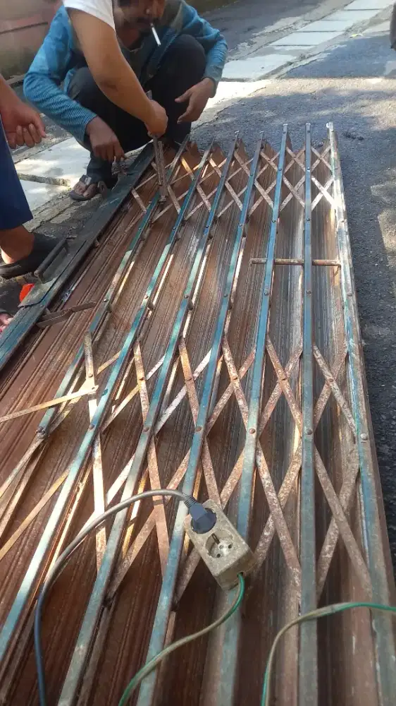 Tukang service rolling door folding gate