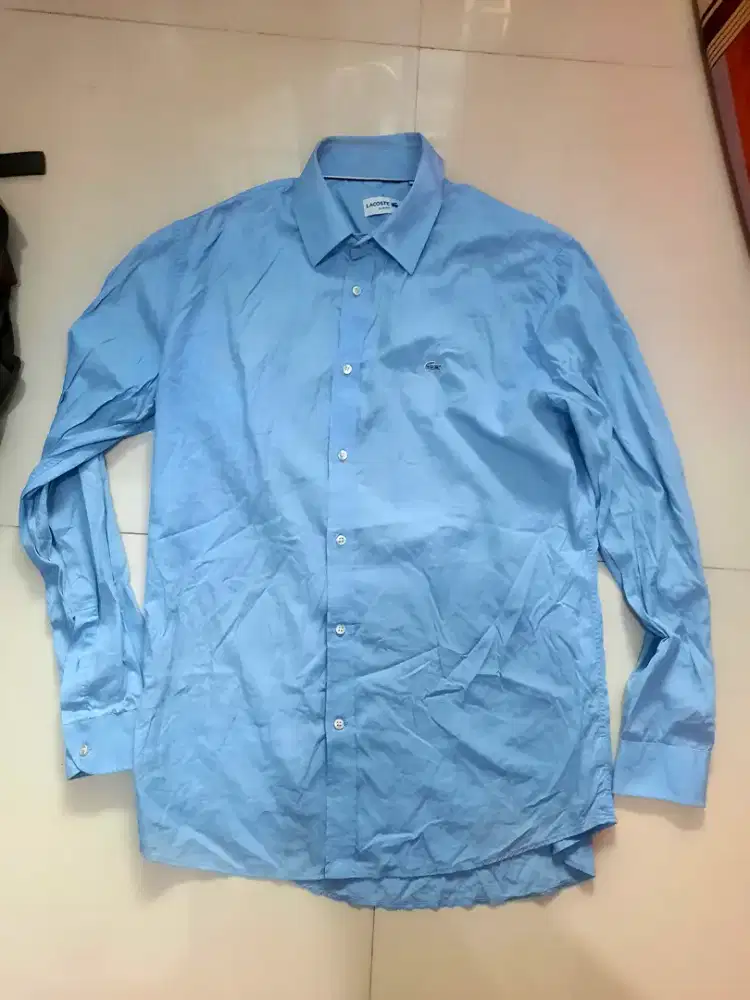 Lacoste. Size. M/L. authentic.