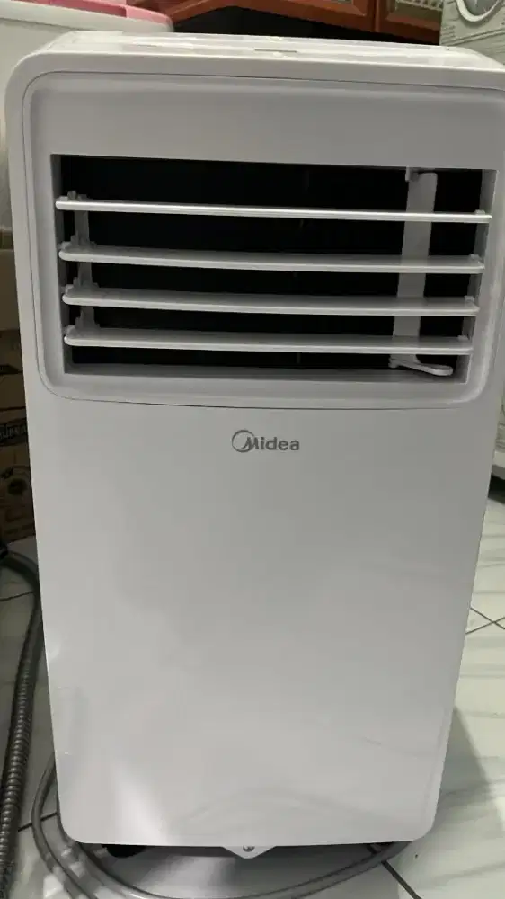 AC PORTABEL MIDEA 1/2PK