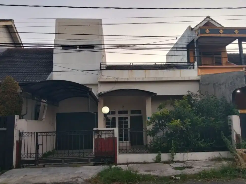 RUMAH DI RAYA WIGUNA TENGAH GUNUNG ANYAR SURABAYA