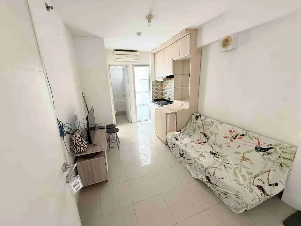 Sewa 2BR semi furnished apartemen Bassura City tower Flamboyan