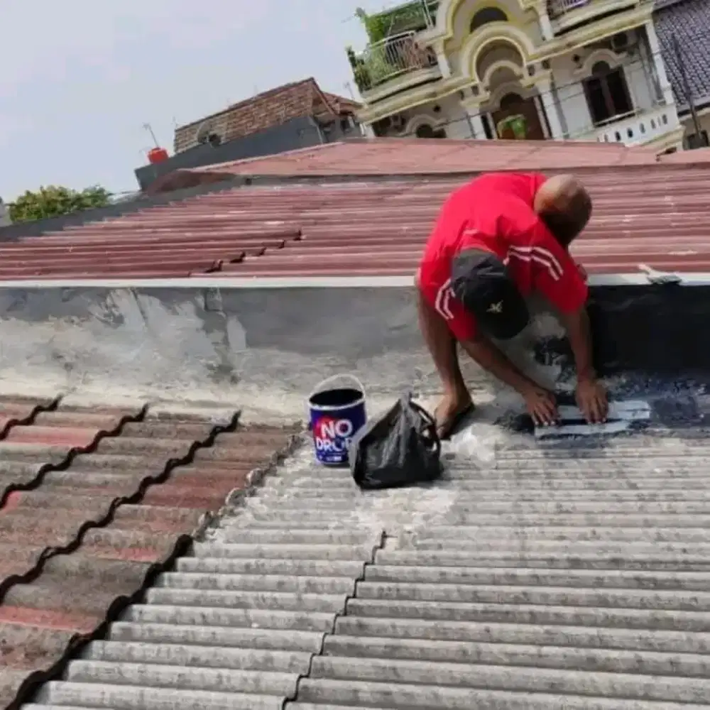 Pasang karamik ganti talang air