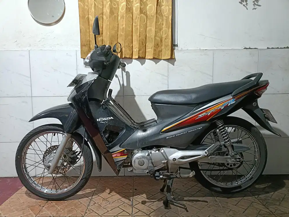 Supra fit tahun 2006 pajak isi/tt boleh gan cash lebih bagus