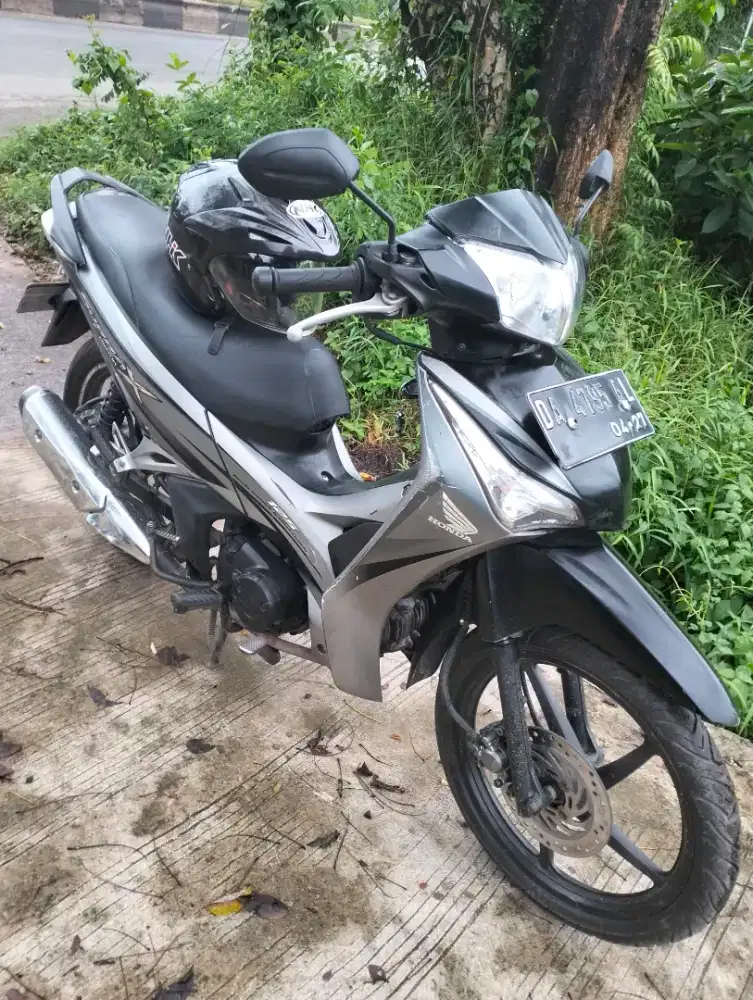 Supra x helm in karbu surat lengkap