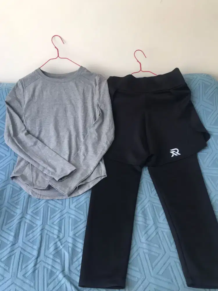 One set baju olahraga baru sekali pake