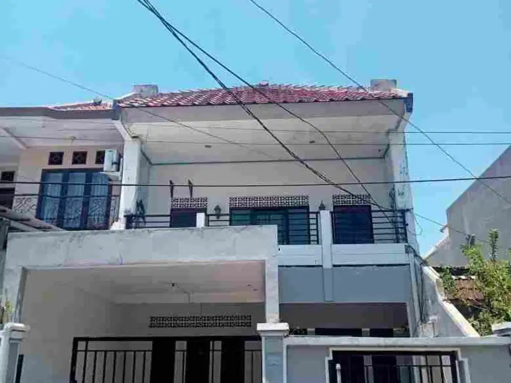 Rumah simpang Darmo Permai Utara