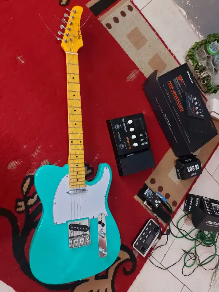 Telecaster clever with maple neck green body by kowe