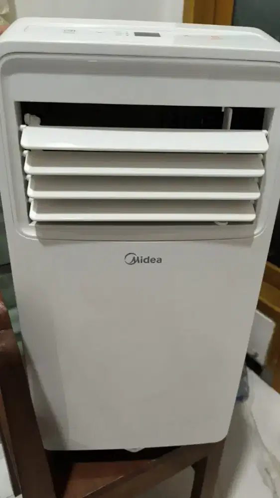 AC portable midea 1/2 pk