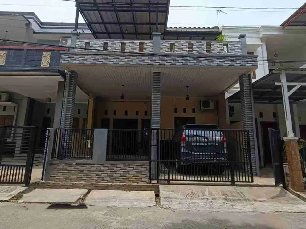 Rumah Depan Taman di Cluster Jatinegara Indah Jakarta Timur – Siap Huni & Bebas Banjir
