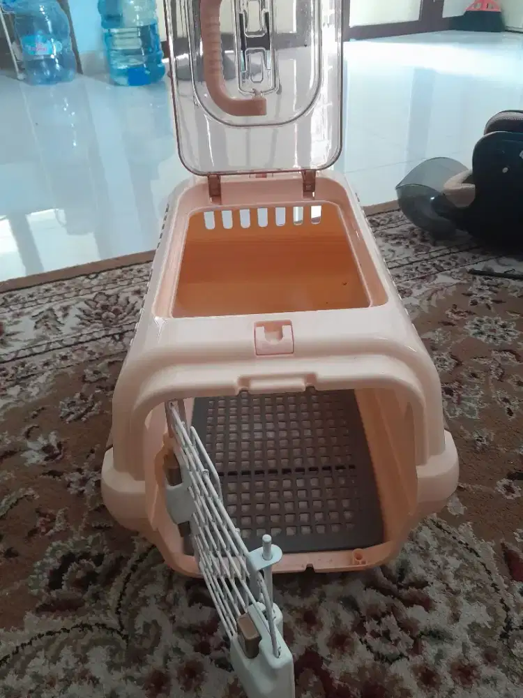 portable pet carrier with a top-opening