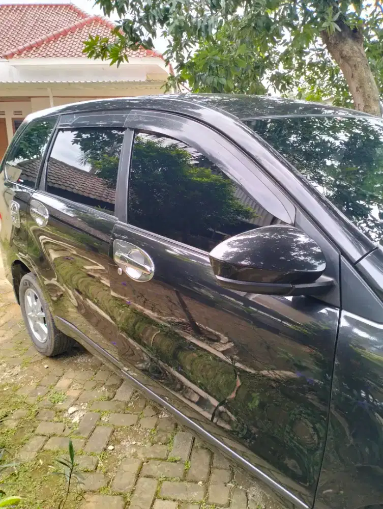 Delaer resmi kaca film mobil di jamin rapi