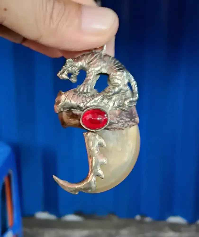 Liontin Kk M can Asli