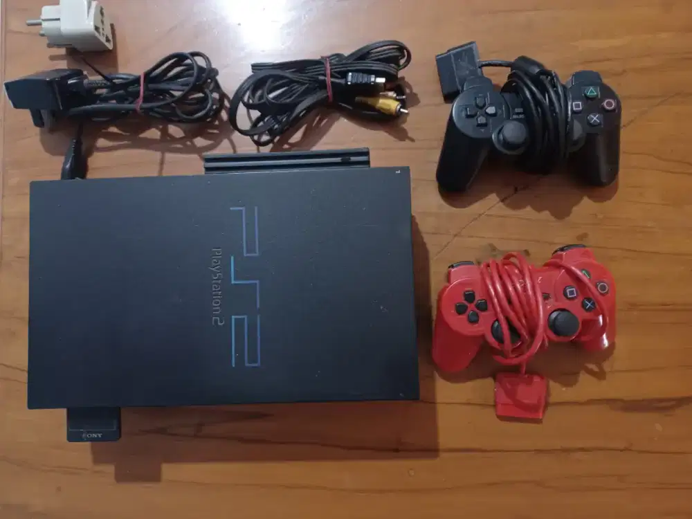 Dijual PS 2.kondisi tinggal main (lengkap)stik originalan.game buanyak