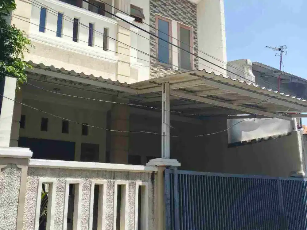 RUMAH MINIMALIS MODERN DI KOMPLEK ABADI DUREN SAWIT