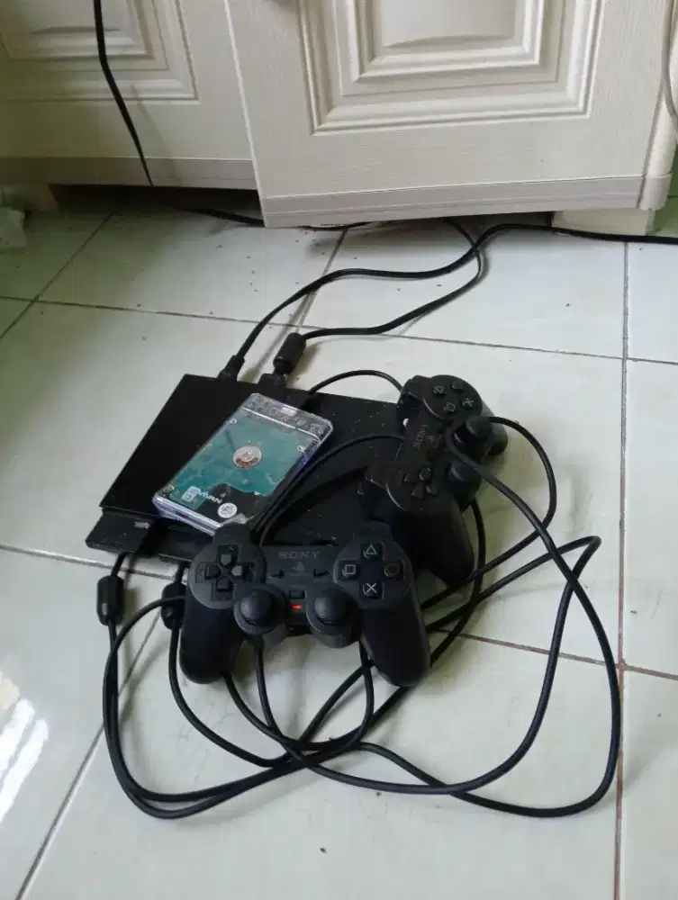 Dijual PS2 Full set stik 2 pasang, game hardic 250gb baru beli sebulan