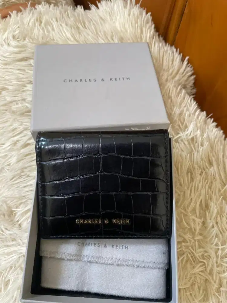 DOMPET CHARLES AND KIETH