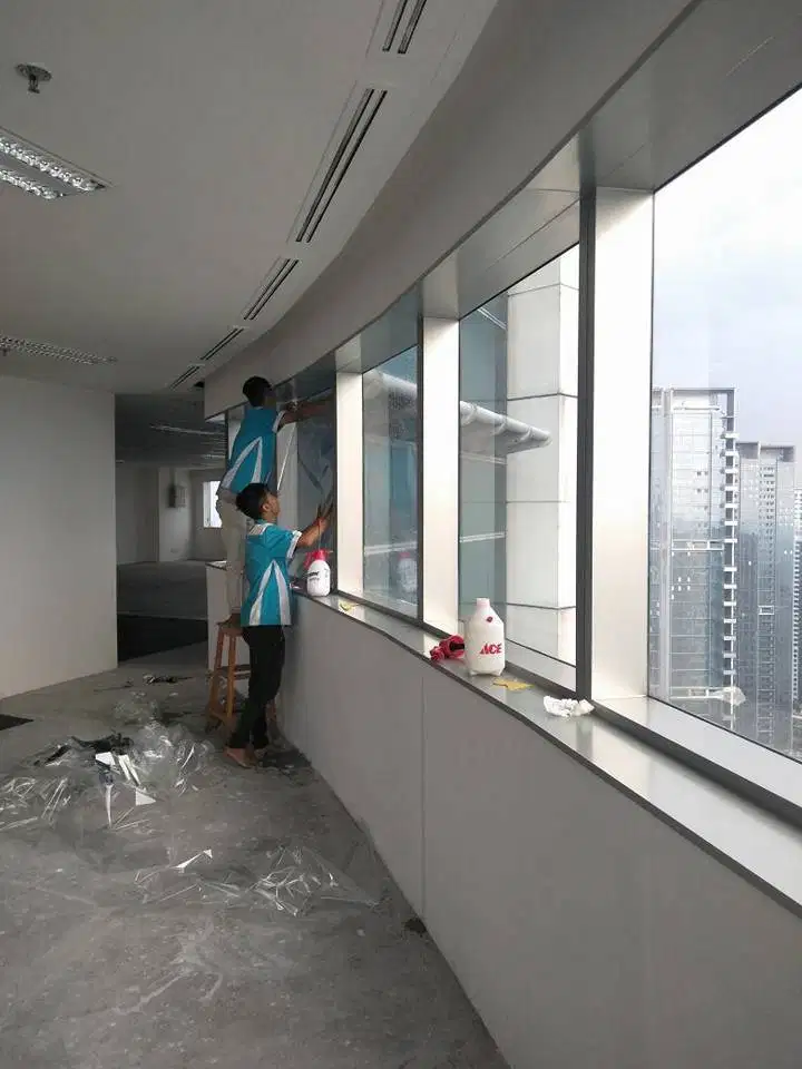 Sticker sunblast dan kaca film gedung