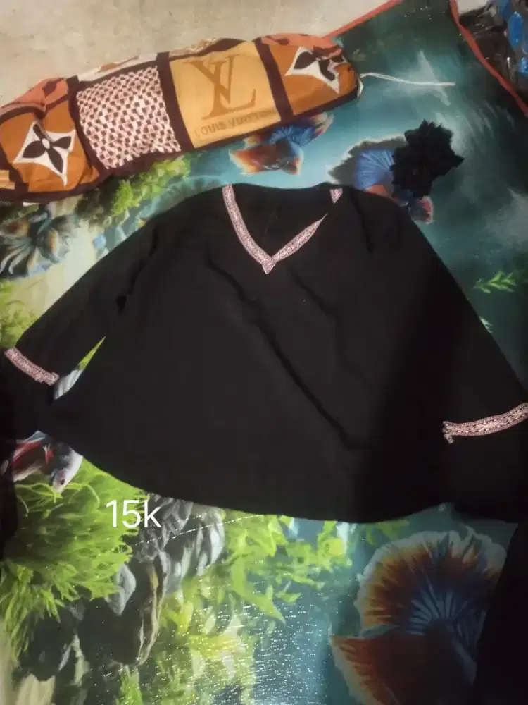 preeloved baju masih bagus