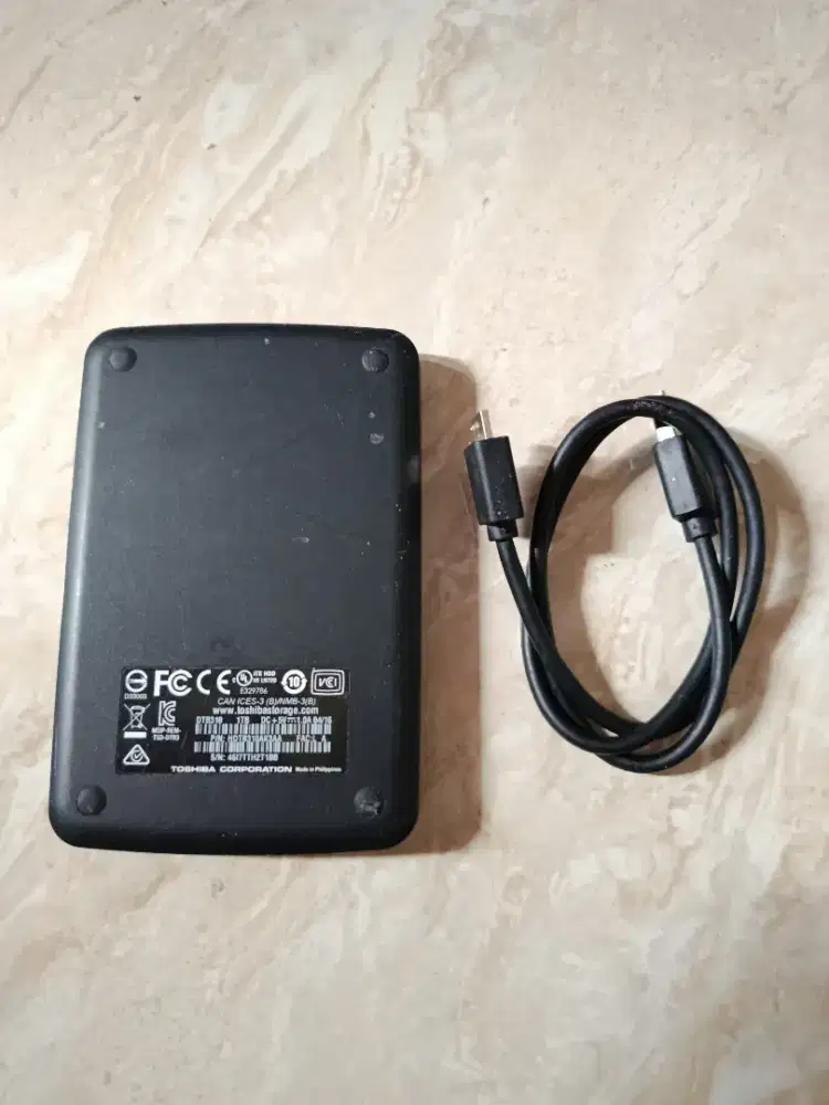 Hardisk eksternal 1TB merek Toshiba sentinel 100%