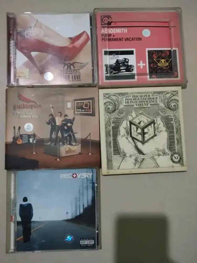 Kaset CD Aerosmith The Sigit Eminem Peterpan