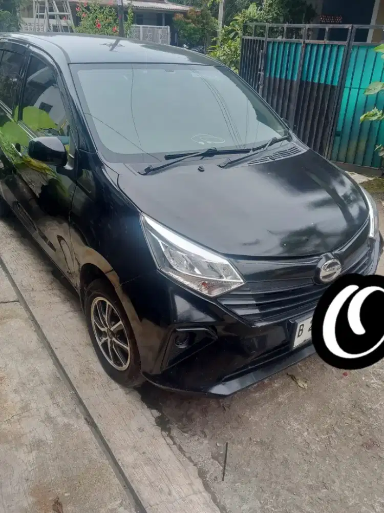 Daihatsu Sigra M MT Hitam.