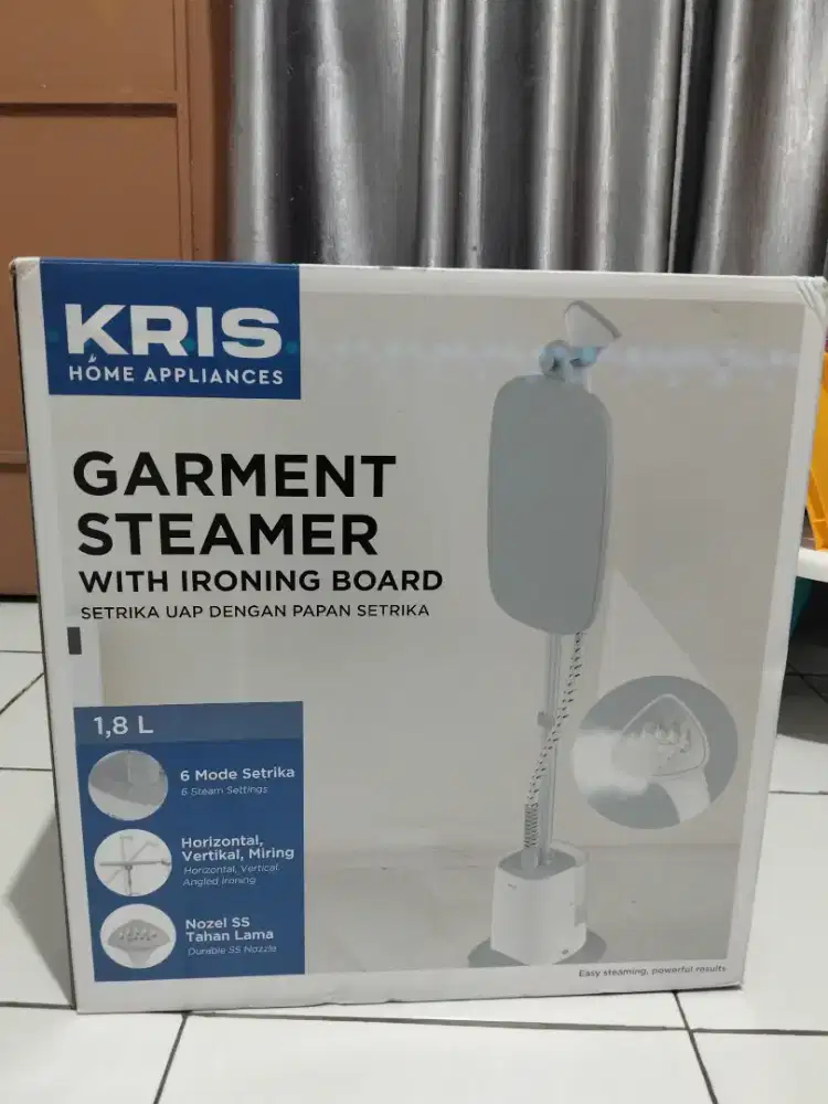 Kris setrika uap garment steamer di lengkapi dengan papan setrika
