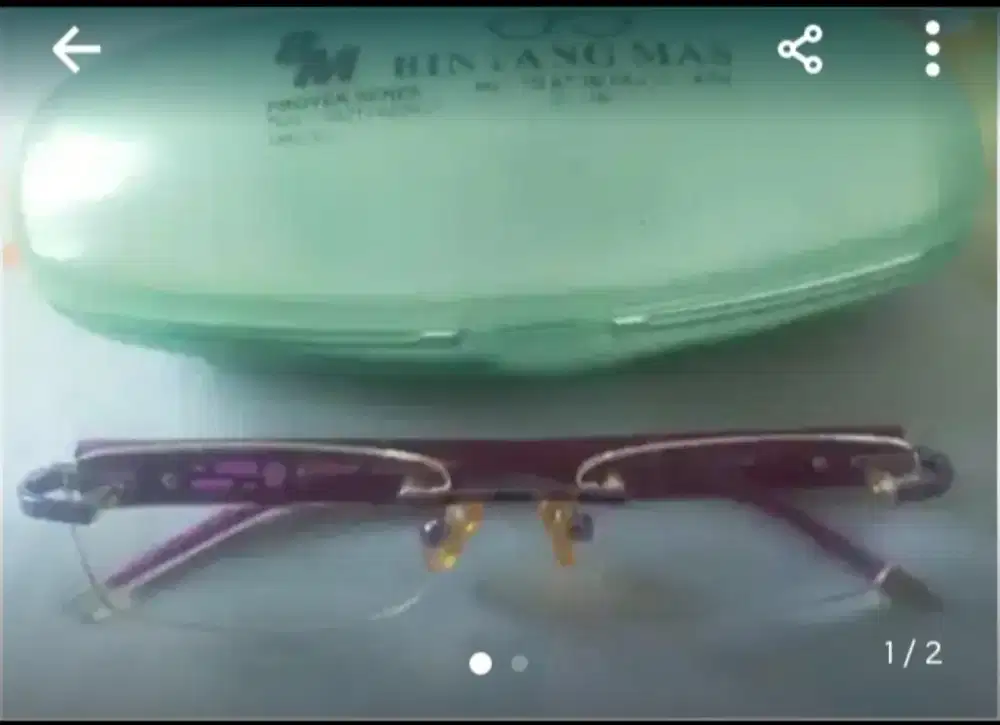 Kacamata ungu merk Polo