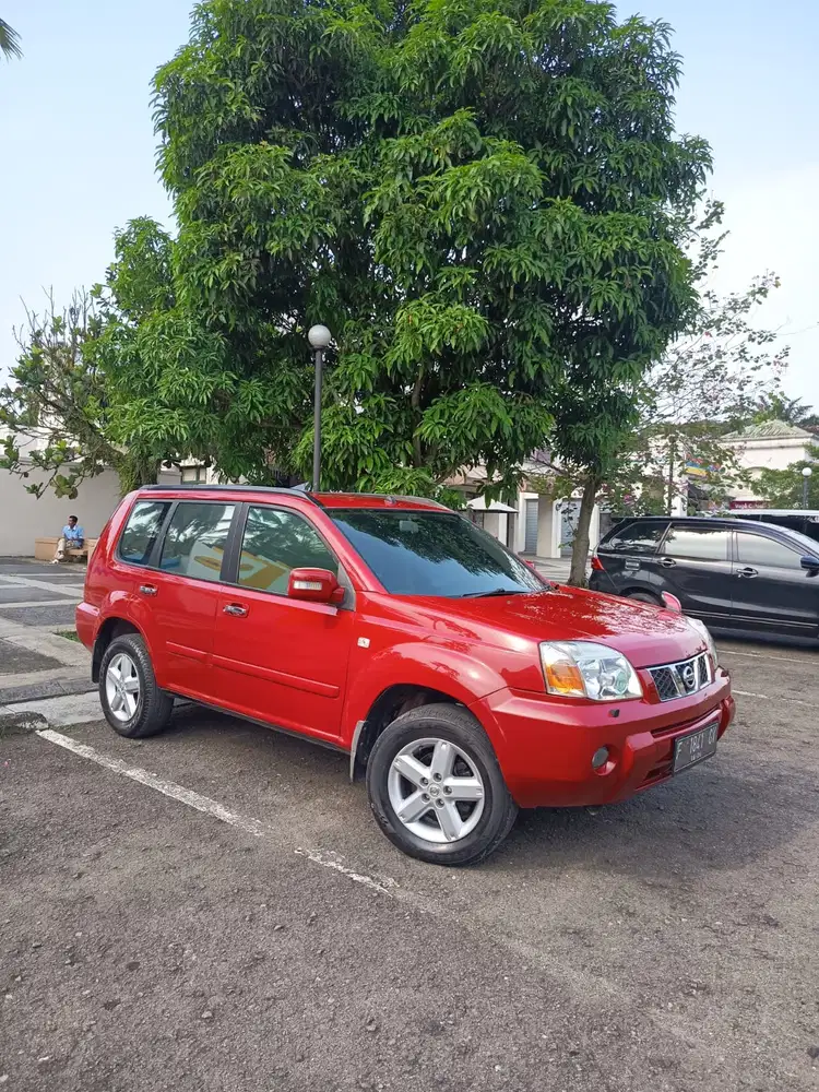 Nissan X-Trail 2006 asli merah sdh facelift jarang ada terawat mulus