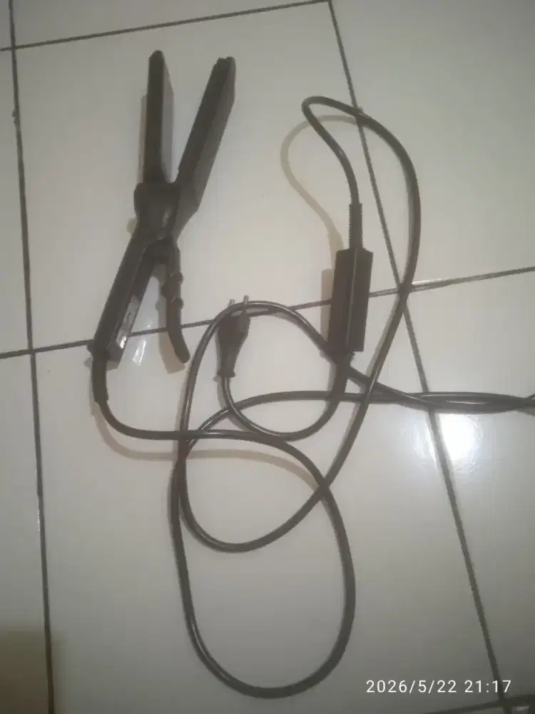 Catokan rambut pengurus rambut