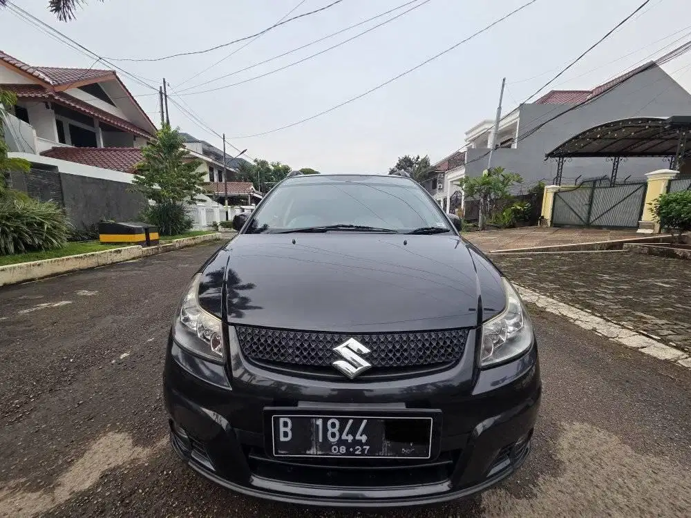 DIJUAL CEPAT SUZUKI X-OVER SX4 MT 2011 99% FULL ORIGINAL JUAL CEPAT