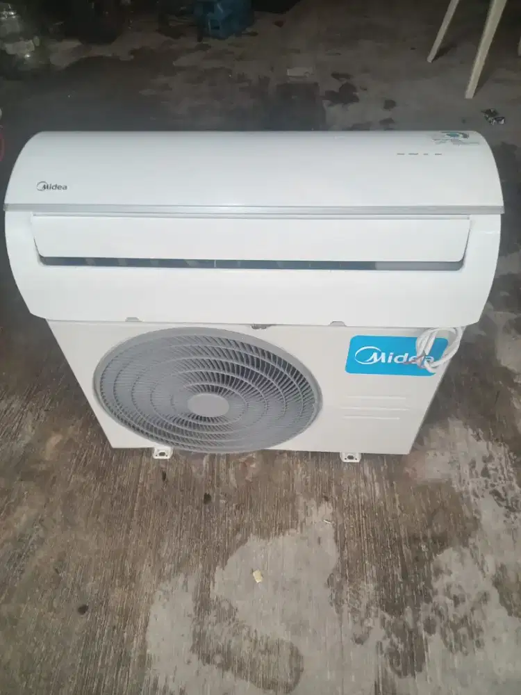 Ac midea 1/2 pk dingin