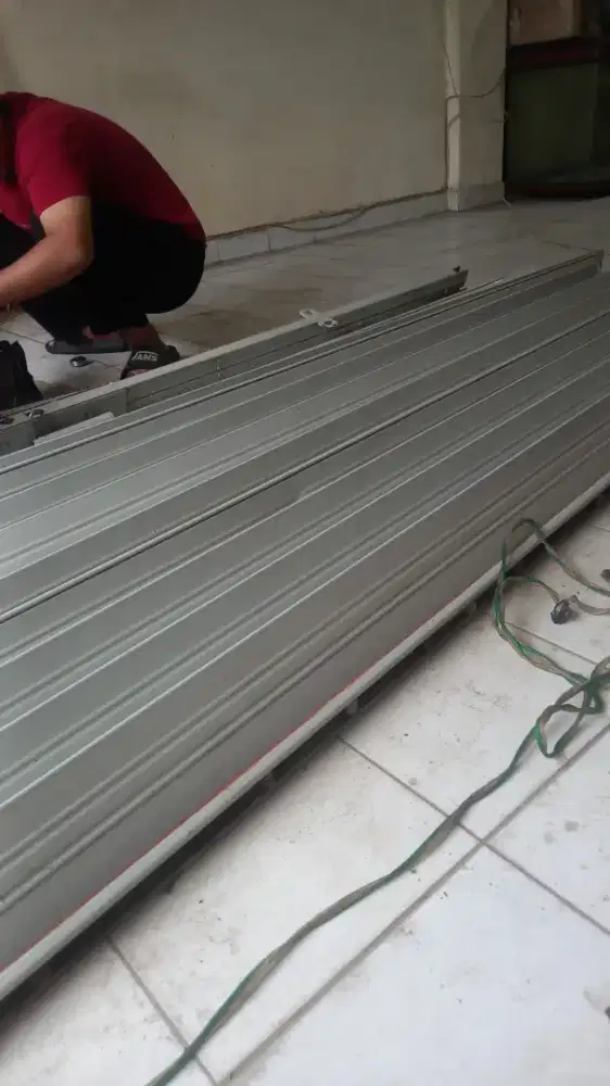 Tukang perbaikan rolling door folding gate murah