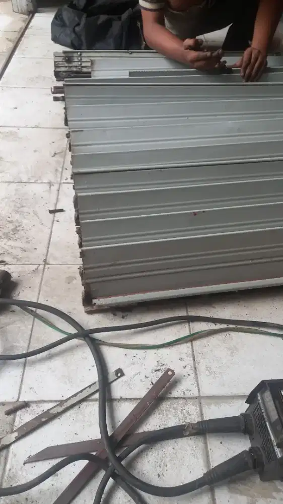 Tukang benerin pintu rolling door dan folding gate