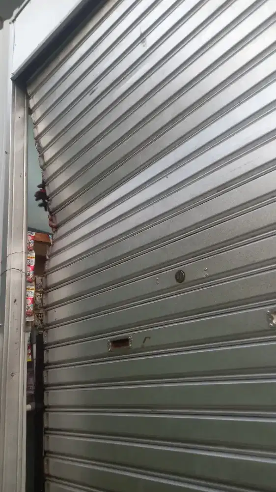 Tukang service rolling door dan folding gate murah