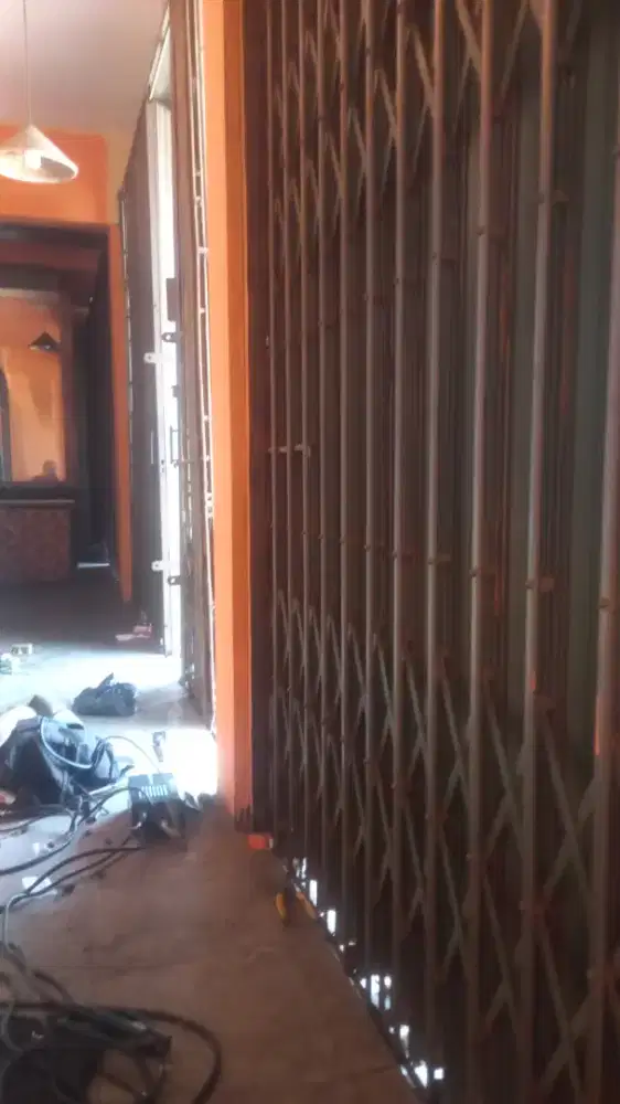 Tukang benerin pintu rolling door dan folding gate murah