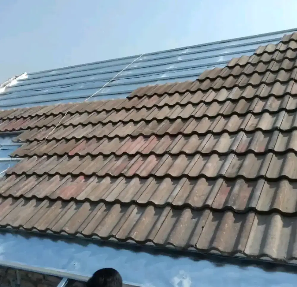 Atap baja ringan terpasang bahan dan tukang bergaransi