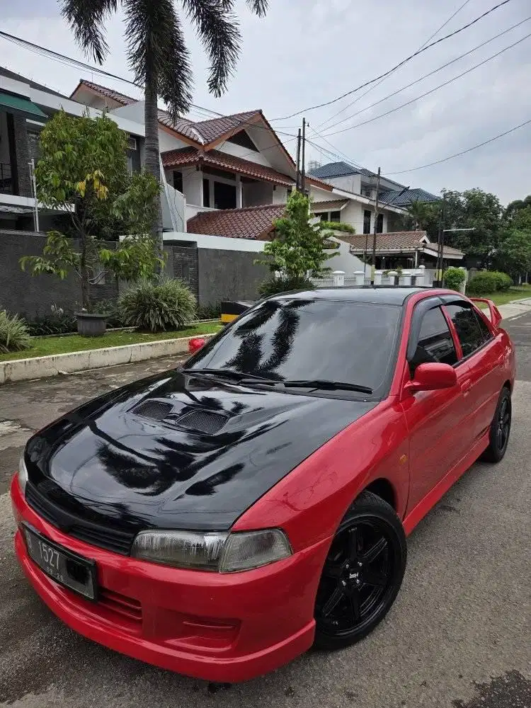 MITSUBISHI LANCER EVO IV 1998 MT FULL AUDIO VELG R17  JOK ORI ADA