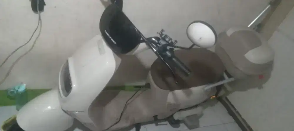 seed listrik united .jarak tempuh 40km masih baru pemkaian 5 buln